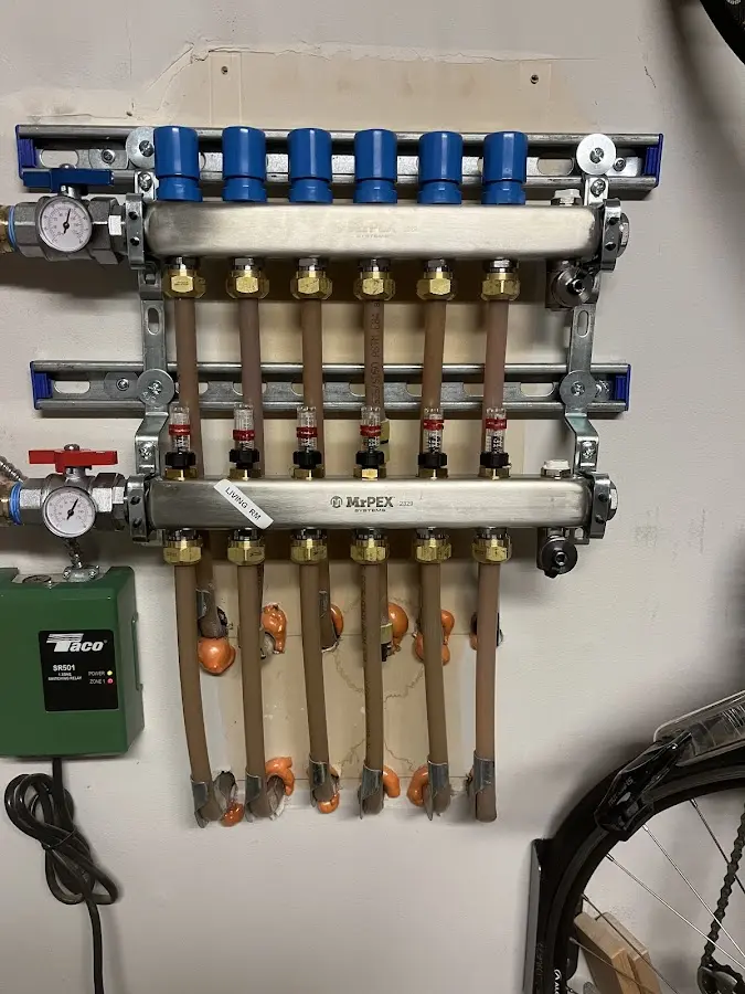 Plumber performing Gas Line Installation at a residential property in Monmouth